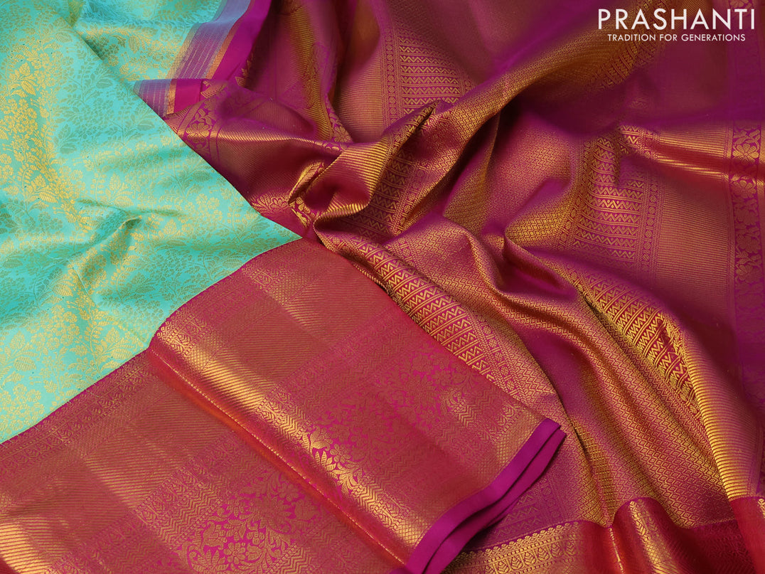 Pure kanjivaram silk saree teal green and magenta pink with allover zari woven brocade weaves and long zari woven border