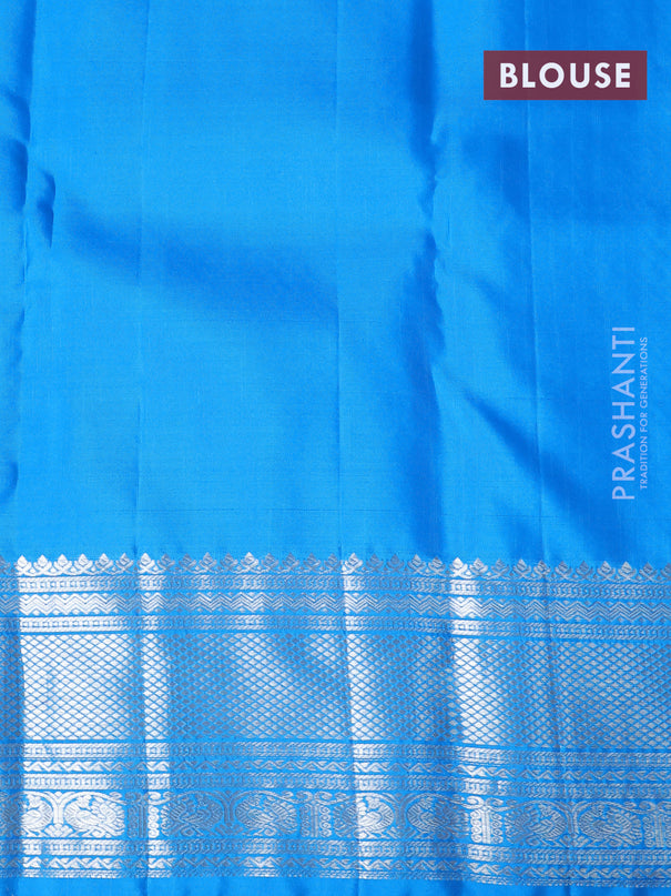 Pure kanjivaram silk saree light pink and cs blue with allover silver zari woven brocade weaves and silver zari woven border