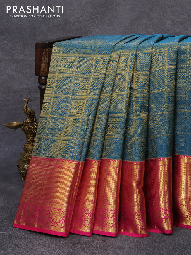 Pure kanjivaram silk saree peacock blue and pink with allover zari woven brocade weaves and zari woven floral border