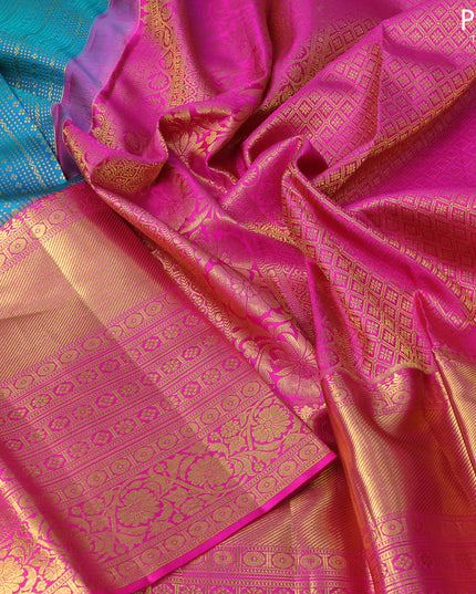 Pure kanjivaram silk saree dual shade of teal bluish green and pink with allover zari woven brocade weaves and long zari woven border