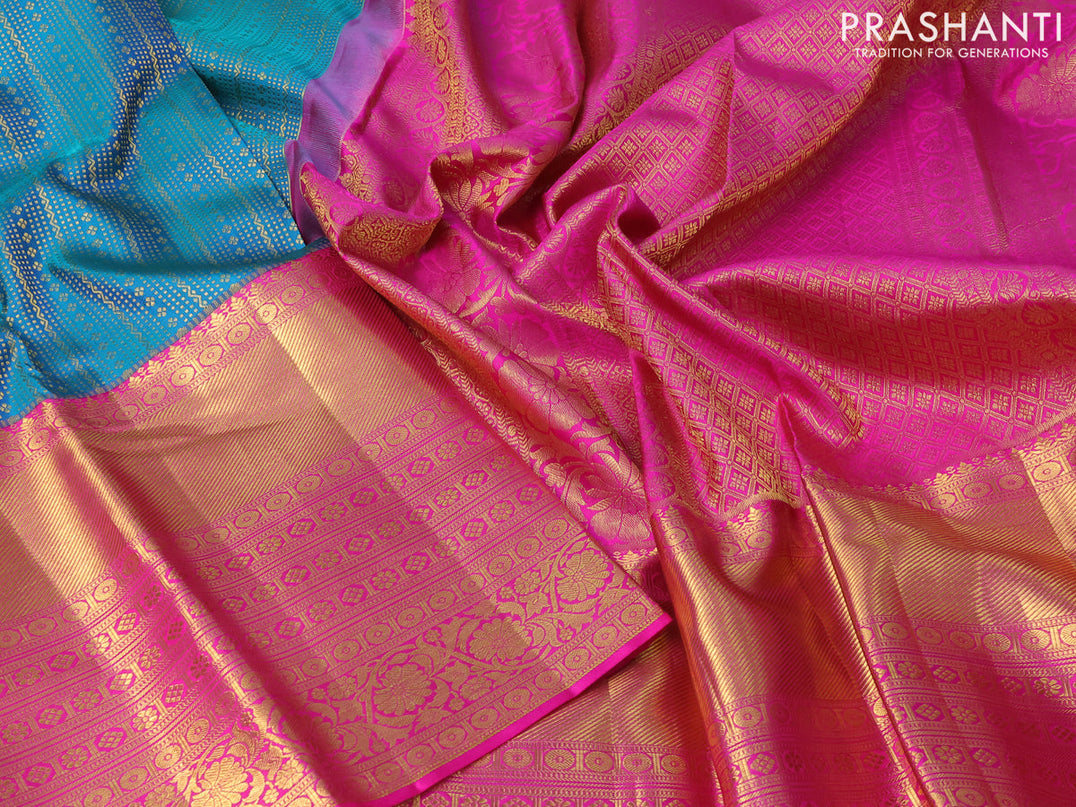 Pure kanjivaram silk saree dual shade of teal bluish green and pink with allover zari woven brocade weaves and long zari woven border