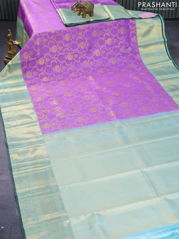 Pure kanjivaram silk saree lavender shade and light blue with allover zari woven floral brocade weaves and long zari woven floral border