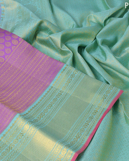 Pure kanjivaram silk saree lavender shade and teal blue shade with allover zari woven butta weaves and zari woven border