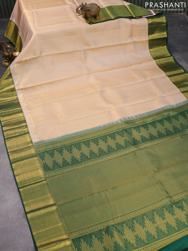 Pure kanjivaram tissue silk saree sandal and black with allover zari weaves and zari woven border