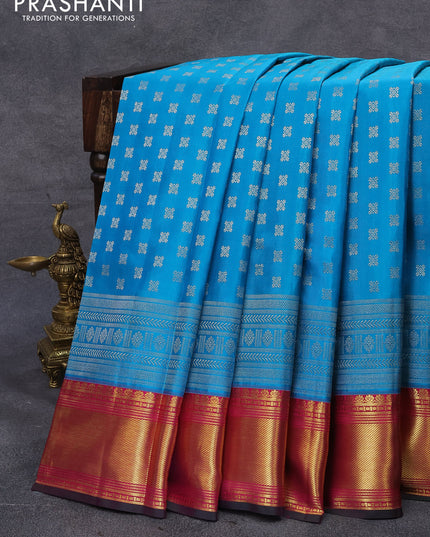 Pure kanjivaram silk saree teal blue and pink with allover silver zari woven buttas and zari woven border