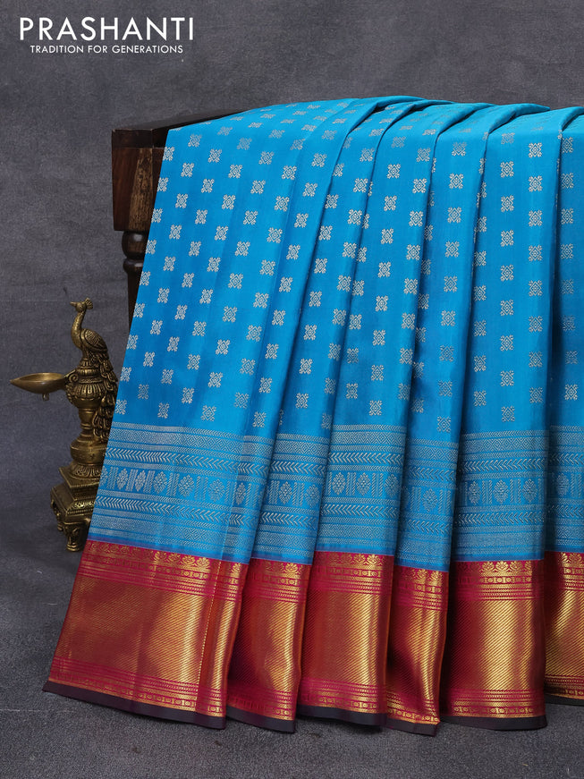 Pure kanjivaram silk saree teal blue and pink with allover silver zari woven buttas and zari woven border