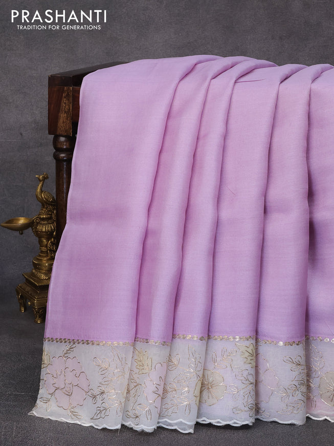 Pure tussar silk saree lavender shade and off white with plain body and organza embroidery work border