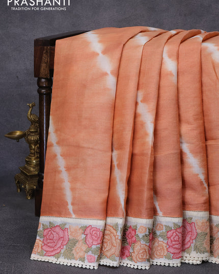 Pure tussar silk saree peach orange and cream with tie & dye prints and floral design embroidery work border