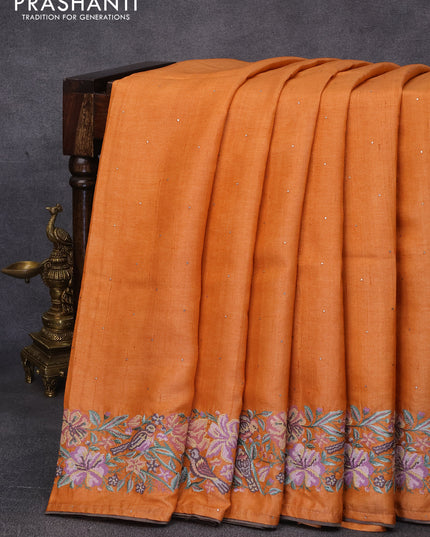 Pure tussar silk saree orange with allover zari buttas and floral design embroidery work border
