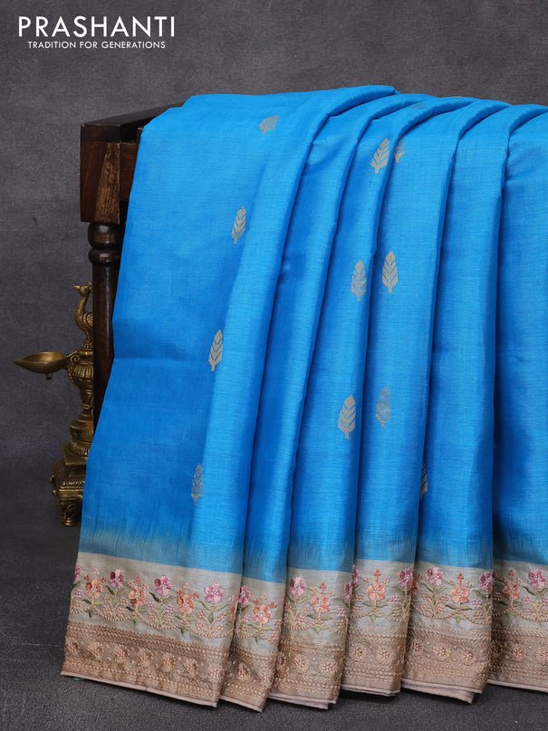 Pure tussar silk saree cs blue and beige with thread woven buttas and floral embroidery work border