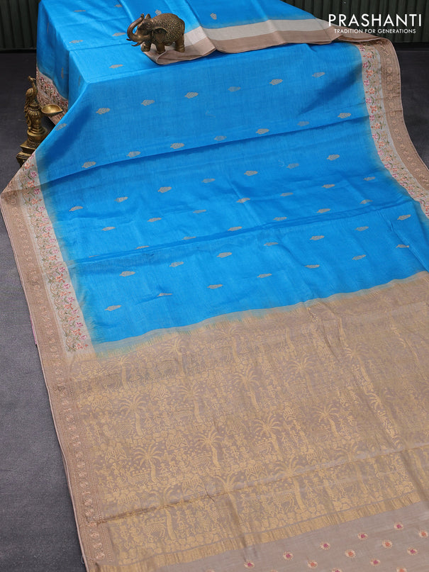 Pure tussar silk saree cs blue and beige with thread woven buttas and floral embroidery work border