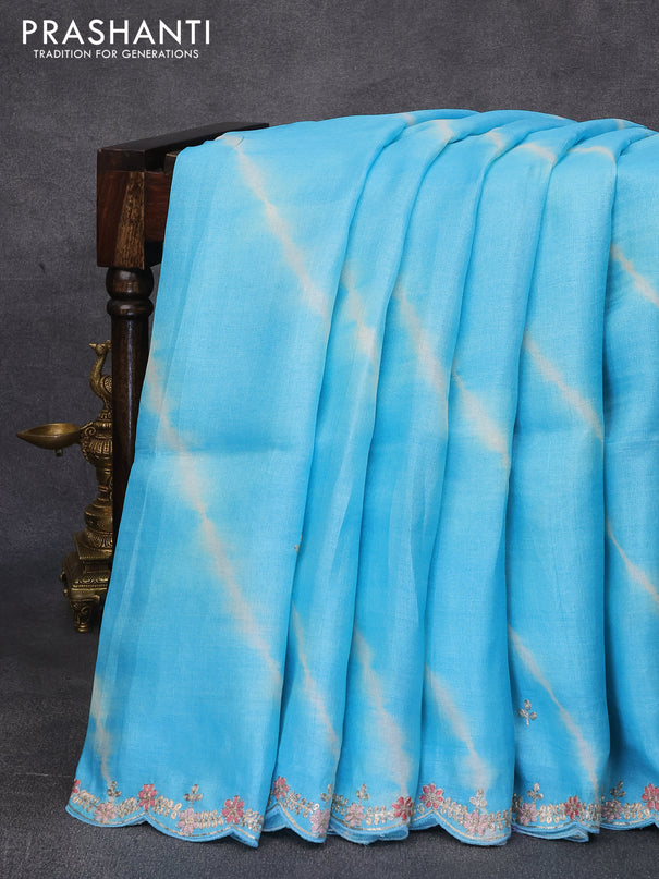 Pure tussar silk saree light blue with tie & dye prints embroidery work buttas and embroidery work border
