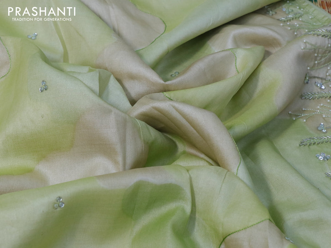 Pure tussar silk saree cream and pista green with sequin work buttas and beaded work border