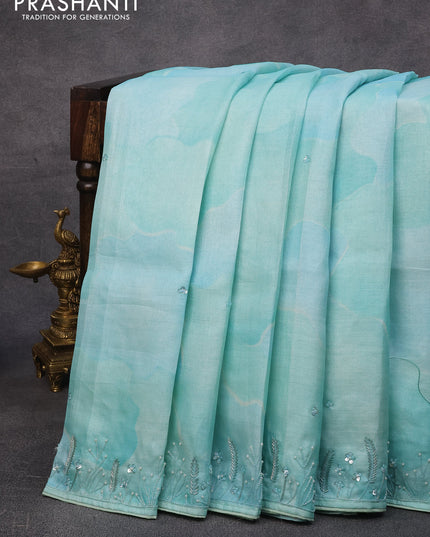 Pure tussar silk saree light blue with sequin work buttas and beaded work border