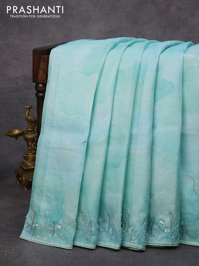Pure tussar silk saree light blue with sequin work buttas and beaded work border