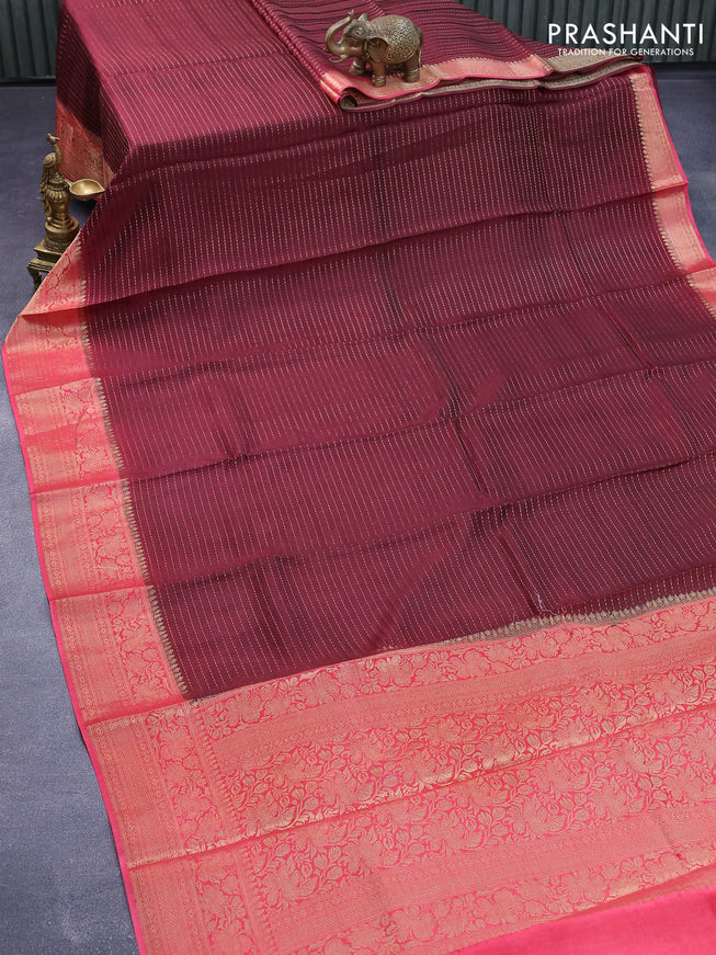Dola silk saree maroon and peach pink with allover zari stripe weaves and zari woven border & zari butta blouse