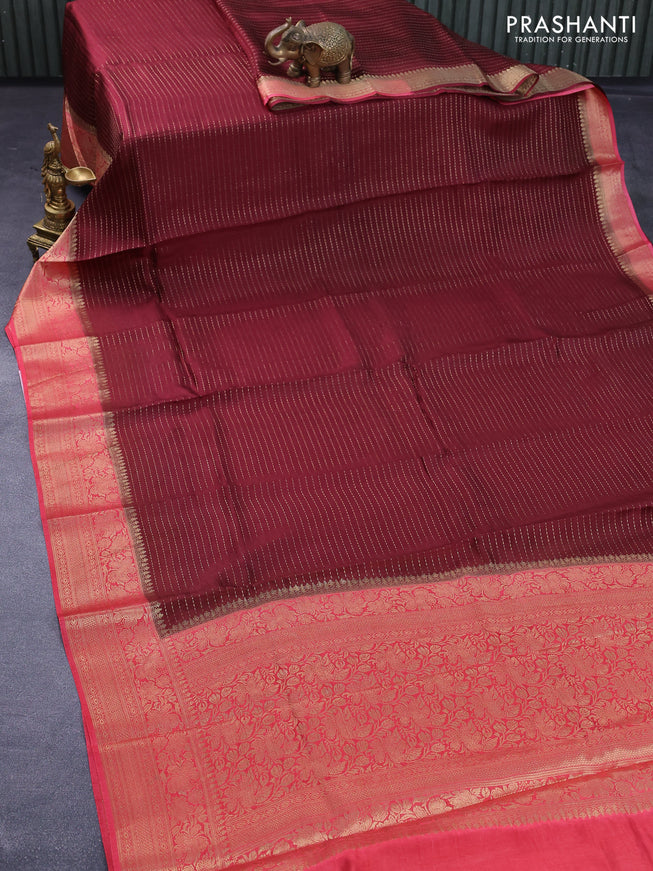 Dola silk saree deep maroon and pink shade with allover zari stripe weaves and zari woven border & zari butta blouse