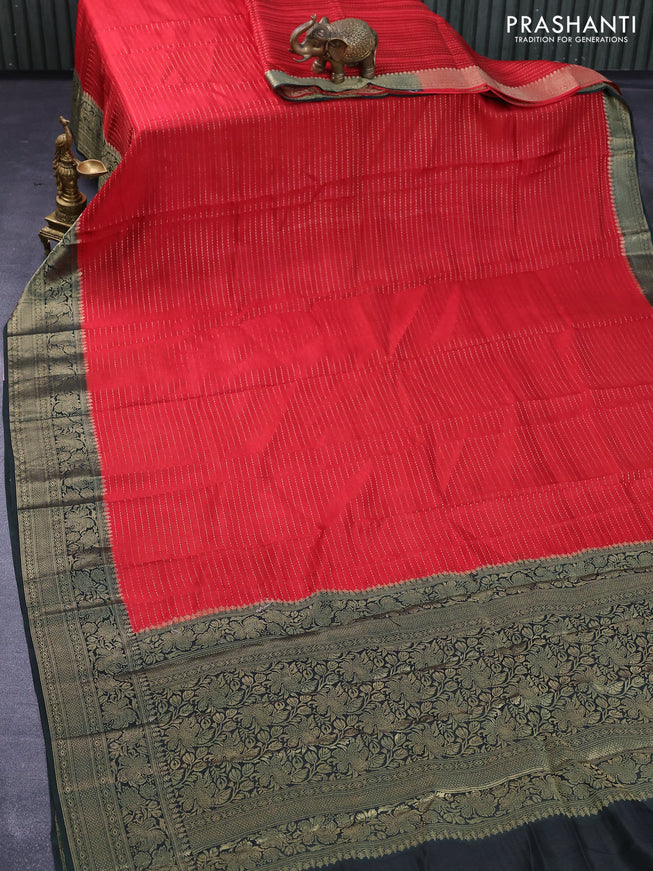 Dola silk saree red and black with allover zari stripes & butta weaves and zari woven border & zari butta blouse