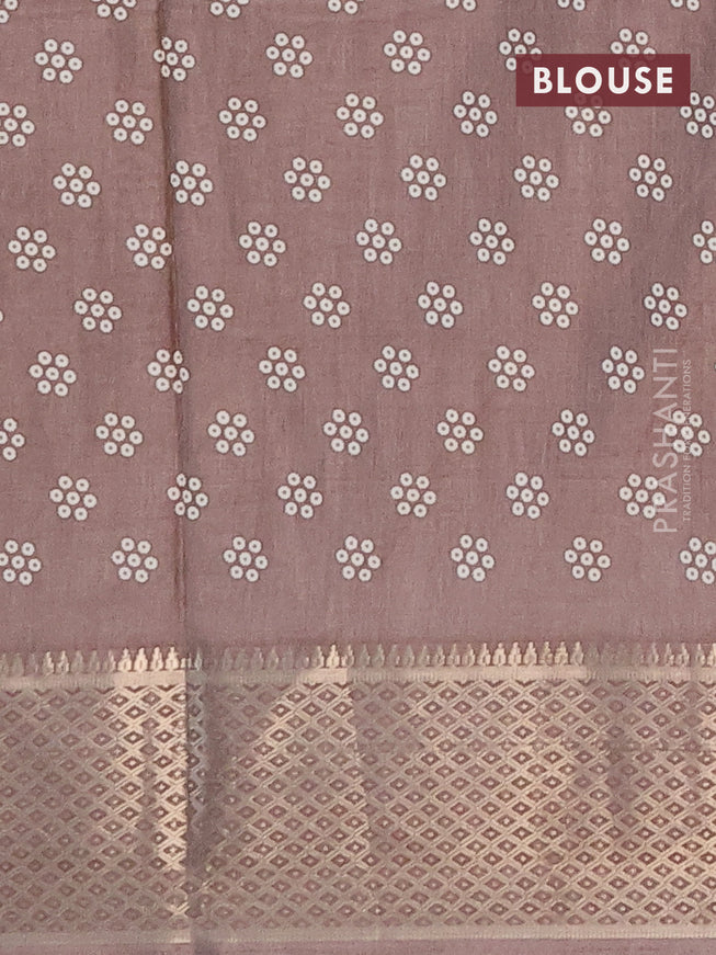 Semi dola saree pastel brown with allover bandhani prints and zari woven border