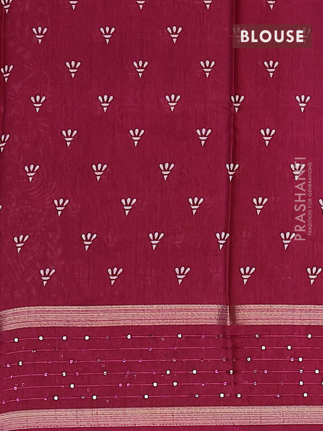 Semi dola saree wine shade with allover prints and zari woven sequin work border