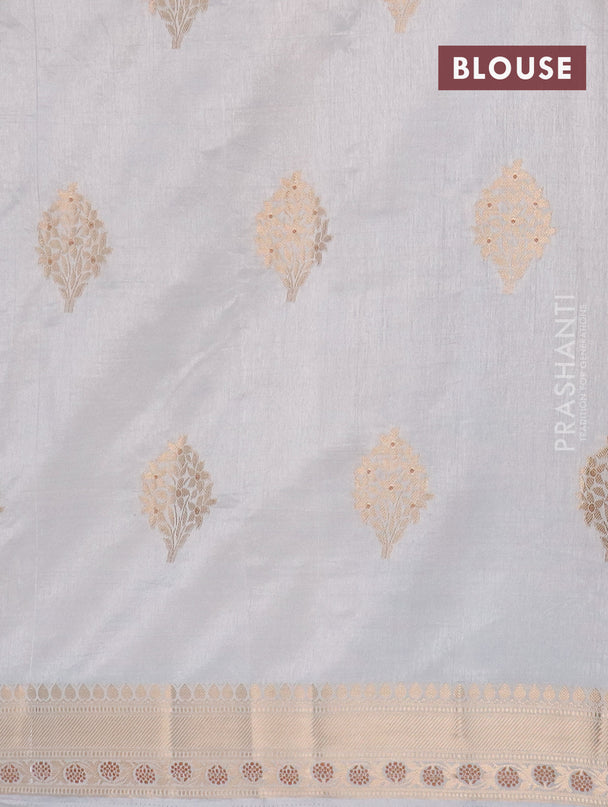 Semi raw silk saree pastel grey with floral zari woven buttas and zari woven border