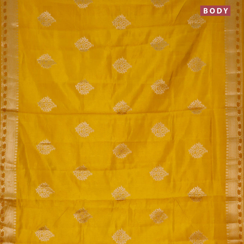 Semi raw silk saree mustard yellow with floral zari woven buttas and zari woven border