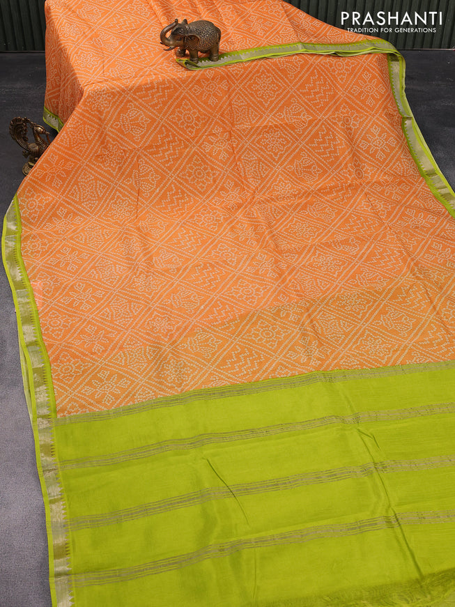 Mangalgiri silk cotton saree orange and lime green with allover bandhani prints and silver zari woven border