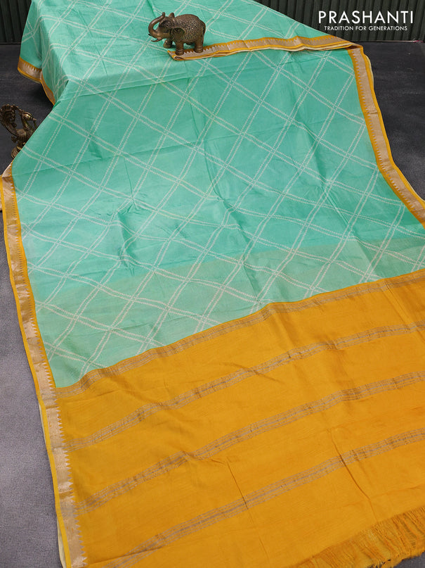 Mangalgiri silk cotton saree teal green and yellow with allover bandhani prints and silver zari woven border