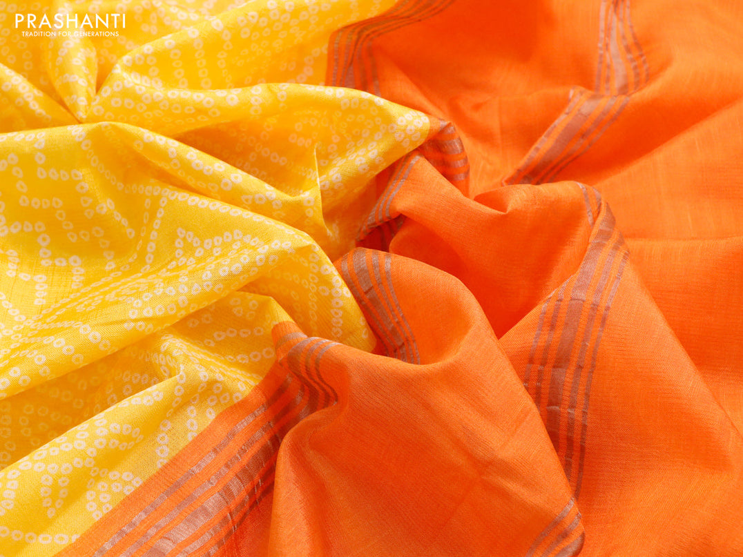 Mangalgiri silk cotton saree yellow and orange with allover bandhani prints and silver zari woven border