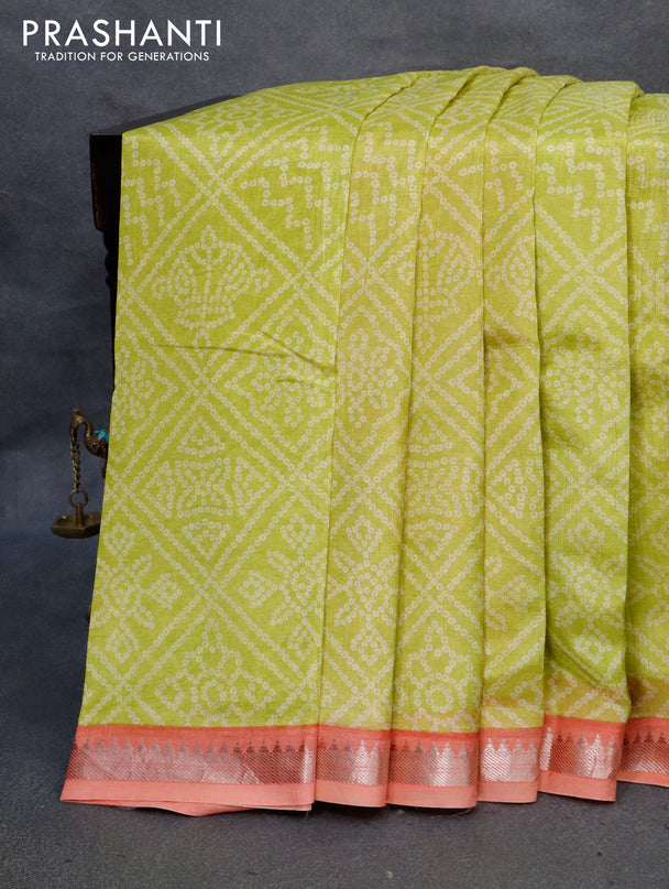 Mangalgiri silk cotton saree lime green and peach orange with allover bandhani prints and silver zari woven border