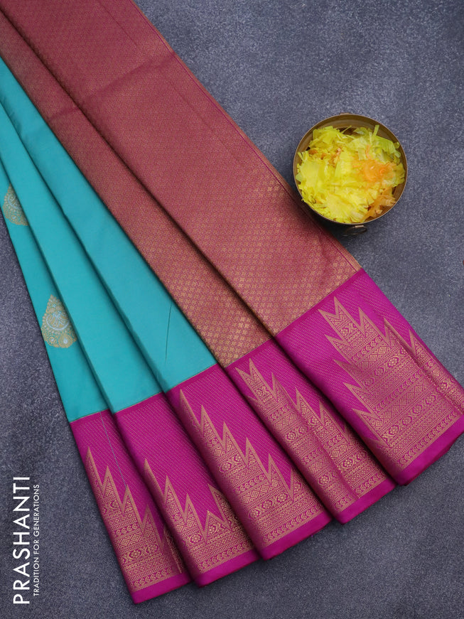 Semi kanjivaram silk saree teal blue and purple with zari woven buttas and long temple design zari woven korvai border
