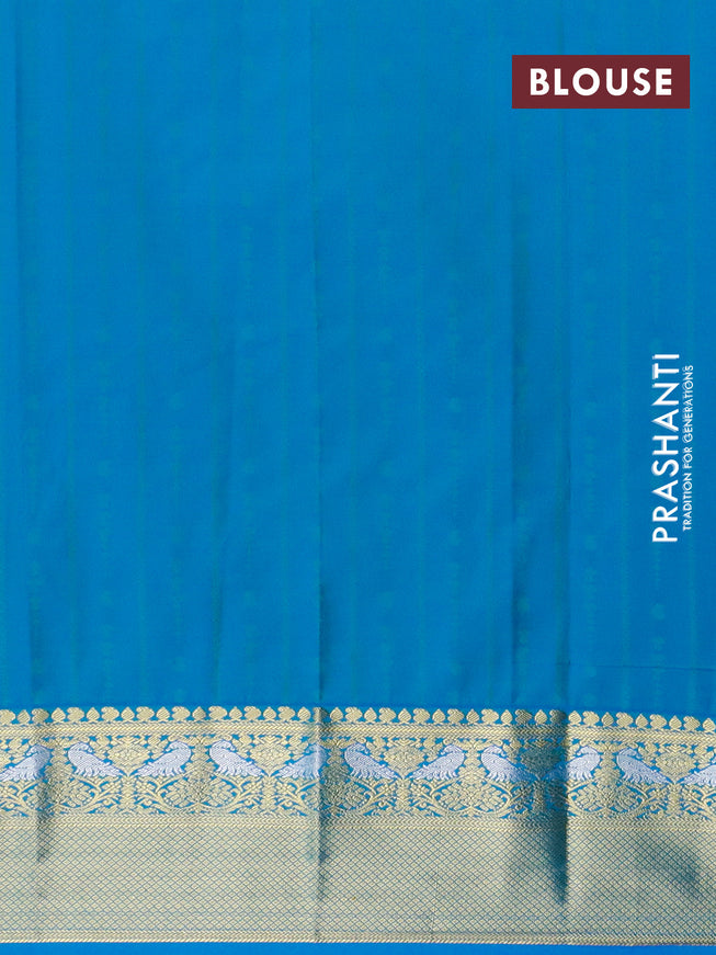 Semi kanjivaram silk saree purple and cs blue with allover zari weaves and zari woven korvai border