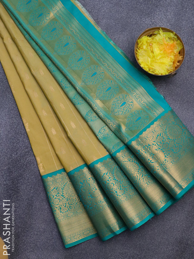 Semi kanjivaram silk saree elaichi green and teal green with allover zari weaves & buttas and long zari woven korvai border