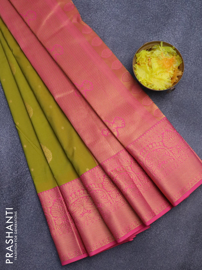 Semi kanjivaram silk saree mehendi green and peach pink with zari woven buttas and zari woven korvai border