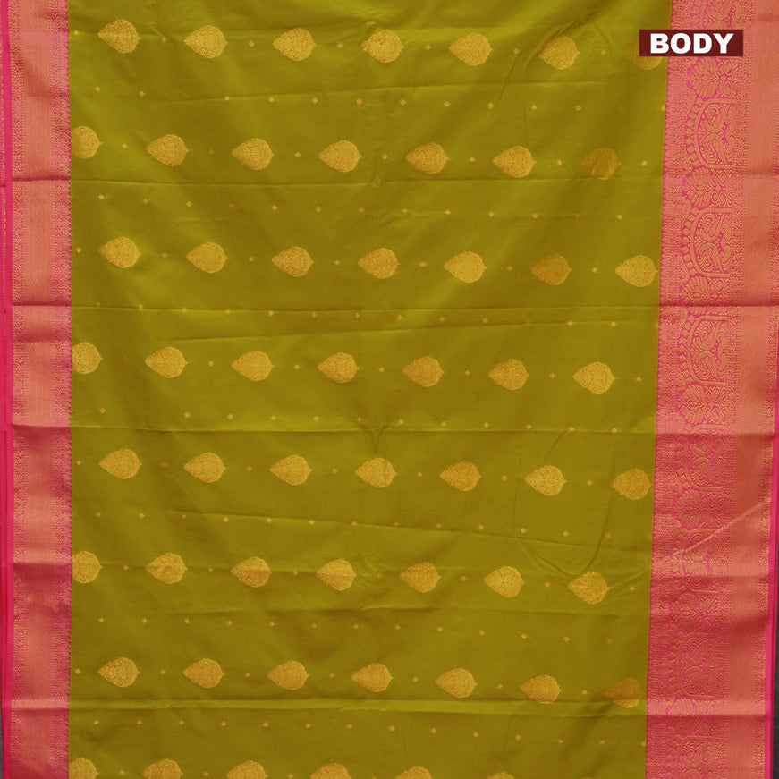 Semi kanjivaram silk saree mehendi green and peach pink with zari woven buttas and zari woven korvai border