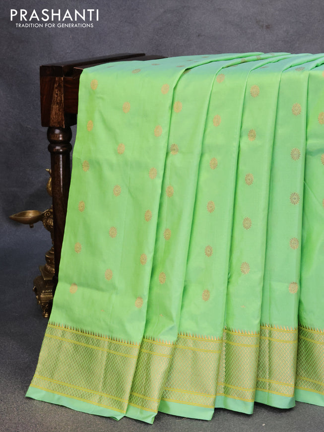 Pure paithani silk saree green shade with zari woven floral buttas and zari woven border