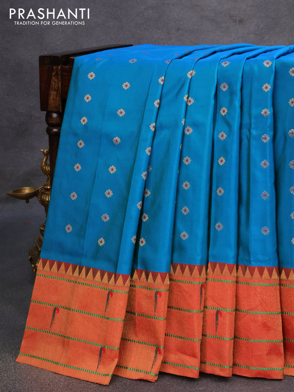 Pure paithani silk saree cs blue and red with allover zari woven floral buttas and zari woven paithani butta border