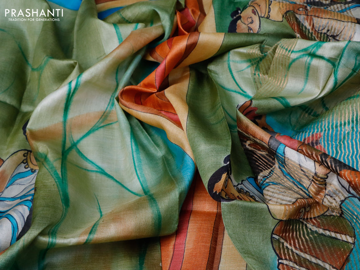 Pure tussar silk saree pastel green and blue rustic orange with hand painted prints and zari woven border