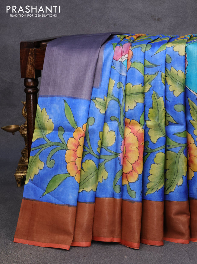 Pure tussar silk saree blue and rust shade with allover kalamkari hand painted prints and zari woven border