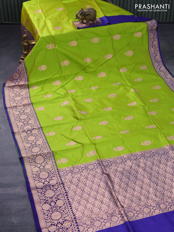 Banarasi katan silk saree light green and blue with copper zari woven floral buttas and floral zari woven border