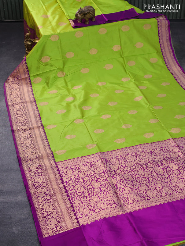 Banarasi katan silk saree light green and purple with copper zari woven buttas and floral zari woven border