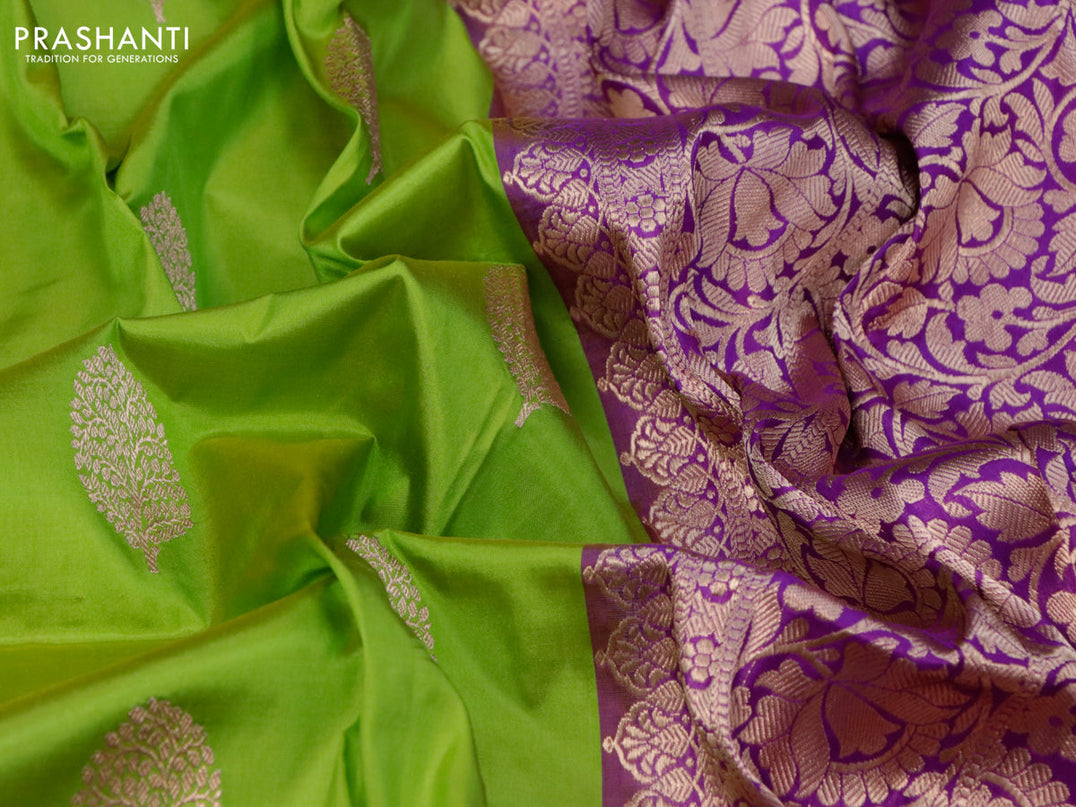 Banarasi katan silk saree light green and purple with copper zari woven buttas and floral zari woven border