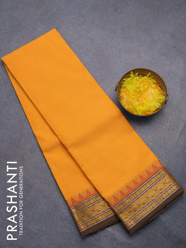 Chettinad cotton saree mango yellow with plain body and zari woven border without blouse