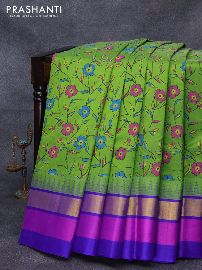 Silk cotton saree light green and blue with floral prints and temple design zari woven simple border