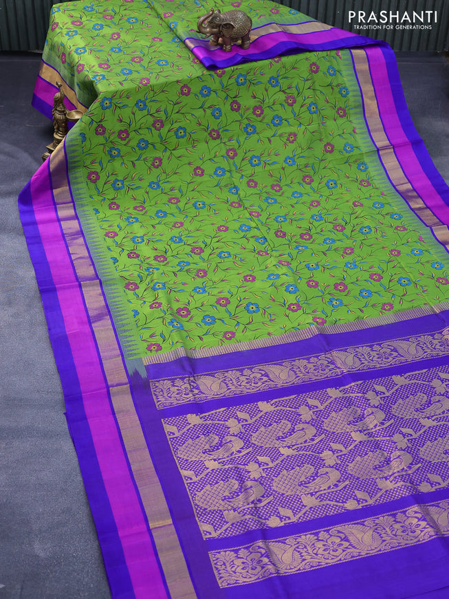 Silk cotton saree light green and blue with floral prints and temple design zari woven simple border