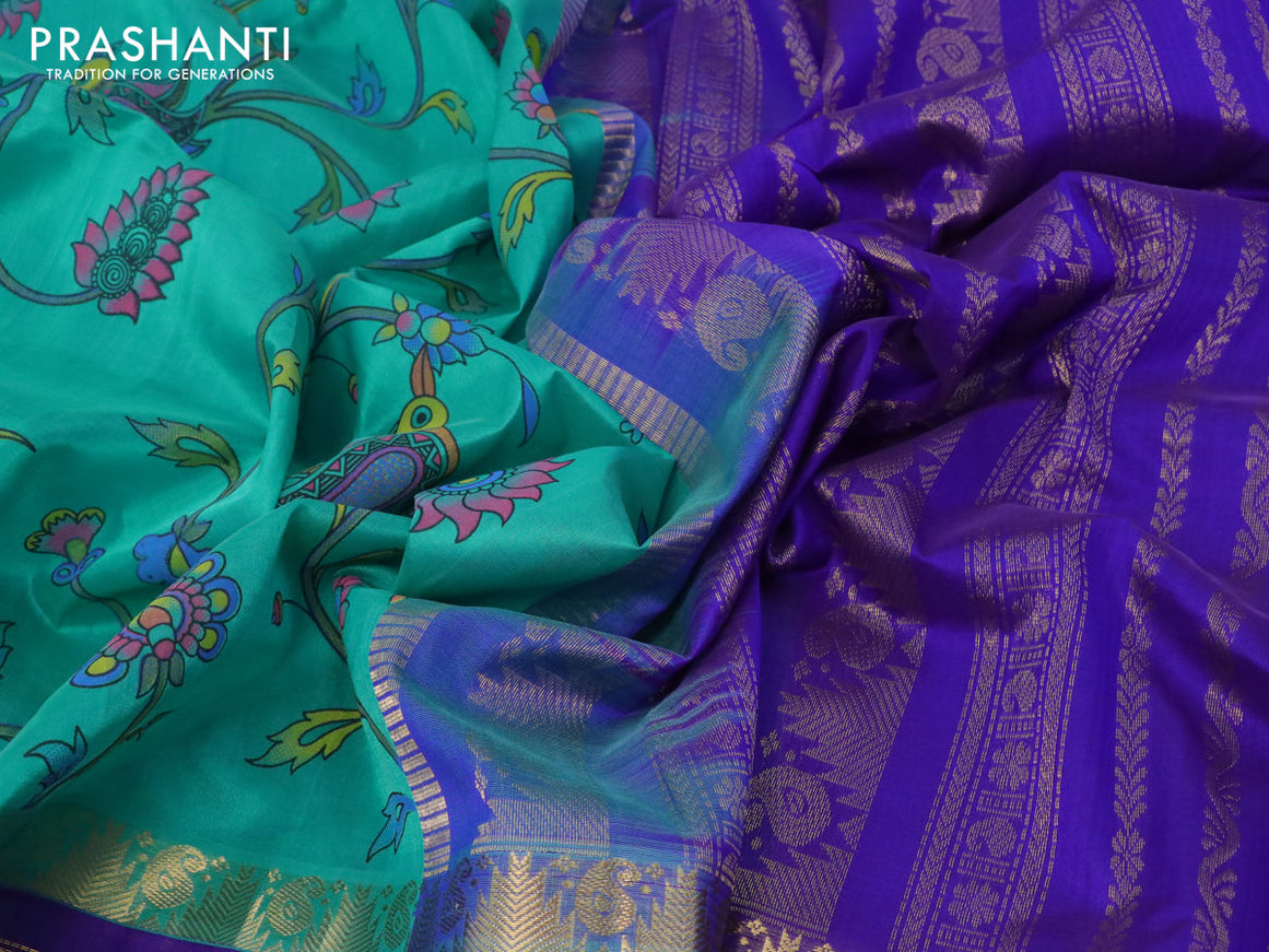 Silk cotton saree teal blue and blue with allover kalamkari prints and rettapet zari woven korvai border