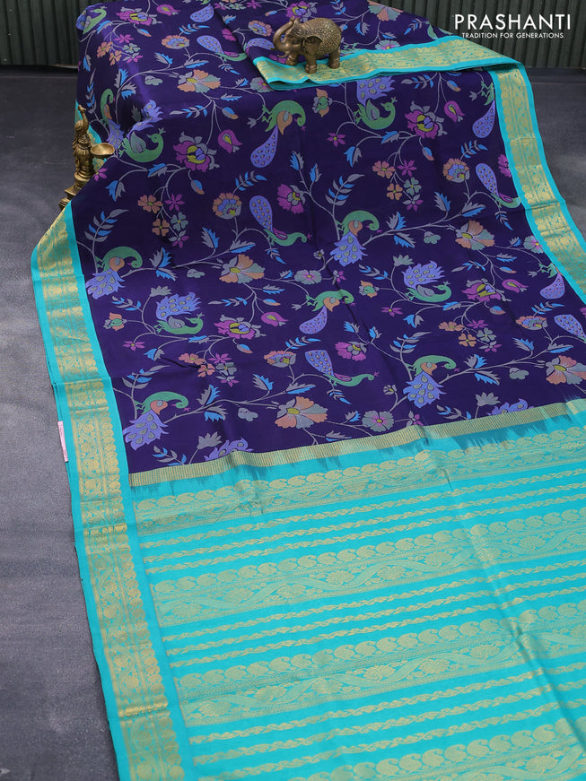 Silk cotton saree dark blue and teal green with allover prints and paisley zari woven korvai border