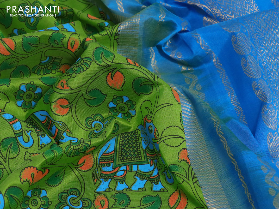 Silk cotton saree light green and cs blue with allover kalamkari prints and paisley zari woven korvai border