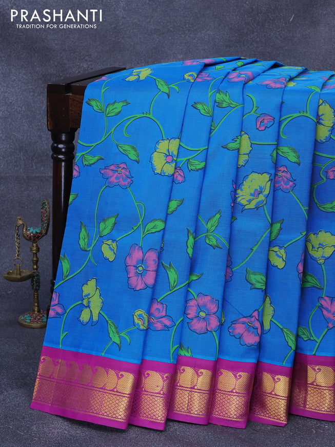 Silk cotton saree cs blue and purple with allover floral prints and paisley zari woven korvai border