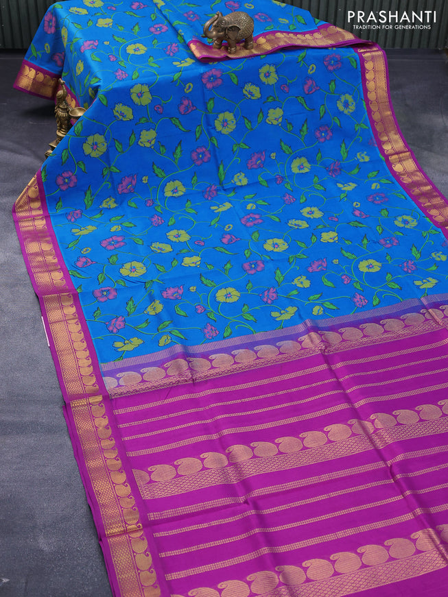Silk cotton saree cs blue and purple with allover floral prints and paisley zari woven korvai border